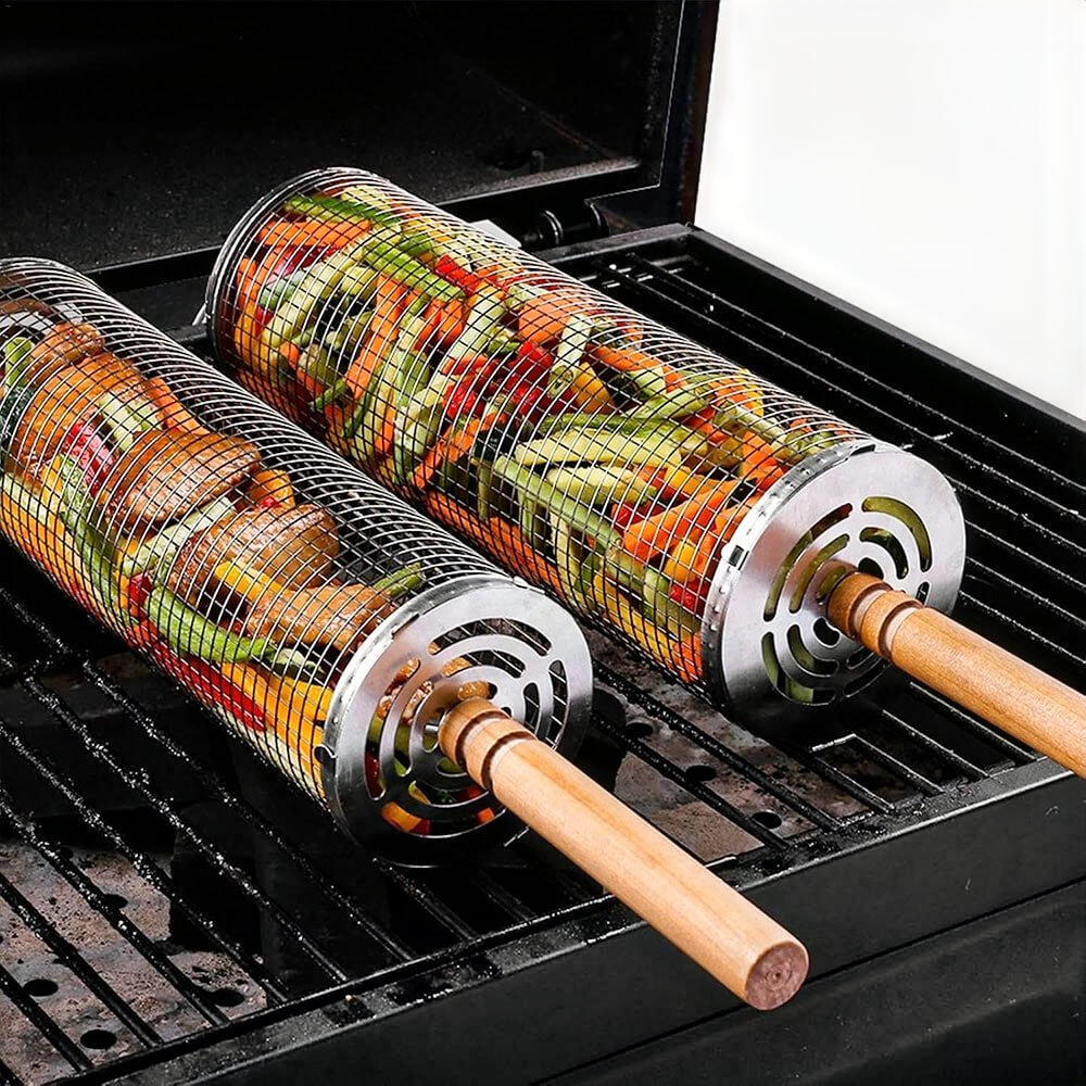 BBQ grill rotisserie baskets with wooden handles, filled with vegetables and meat, roasting evenly on an open grill.