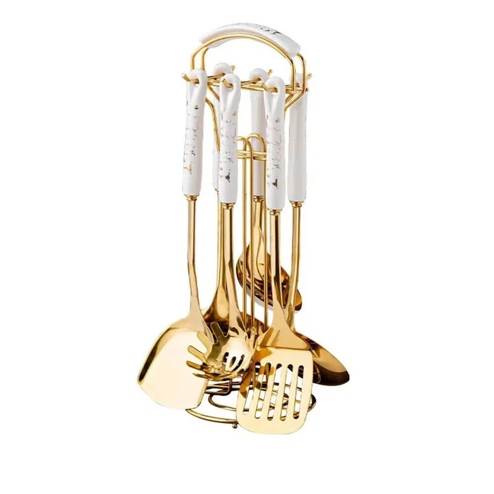 Elegant gold stainless steel utensil set with white marble-style handles, displayed on a matching gold stand.