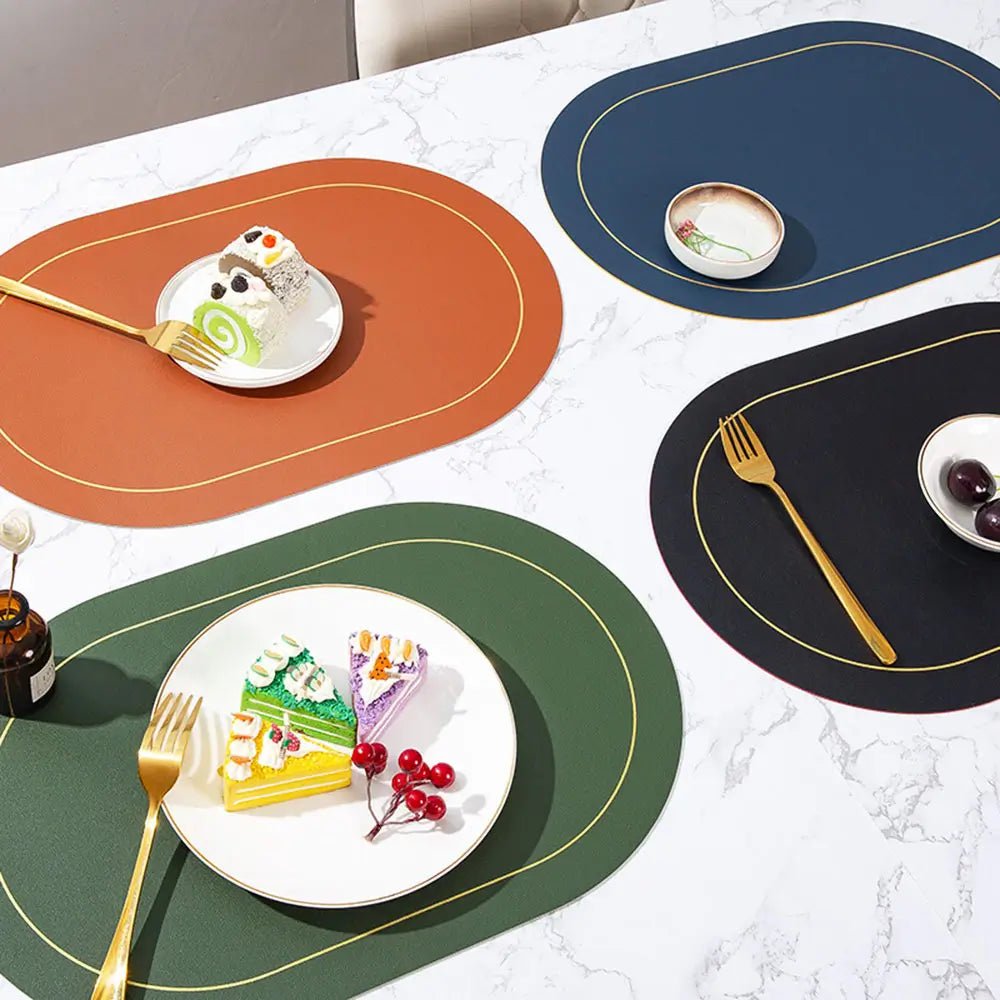 Faux leather placemats set of 6 in brown, navy, black, and green on a marble table, styled with plates, forks, and desserts.
Ask ChatGPT