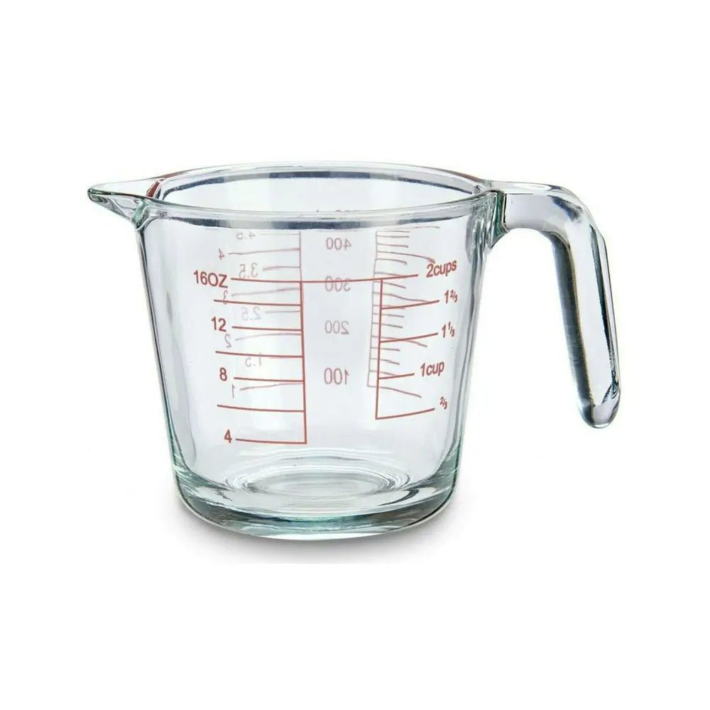 Clear glass measuring cup with red markings for ounces, cups, and milliliters. Ideal for precise baking and cooking measurements.