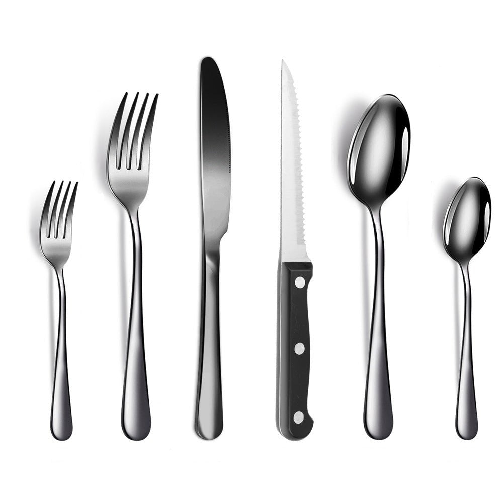 Black stainless steel flatware set with forks, spoons, table knife, and serrated steak knife with black handle on white background.