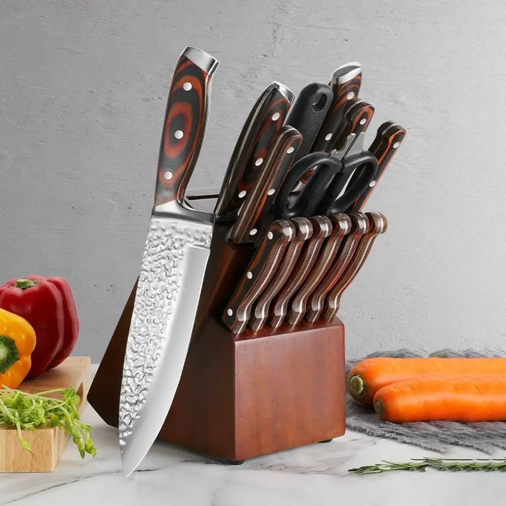 Wooden knife block set with stainless steel knives, kitchen shears, and sharpening steel, displayed on counter with vegetables.