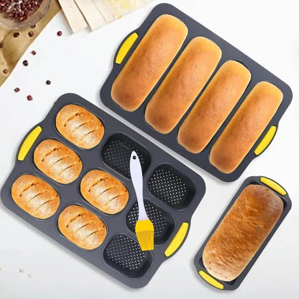 Non-stick loaf pan set with multiple sizes, yellow handles, and fresh baked bread loaves, perfect for home baking.