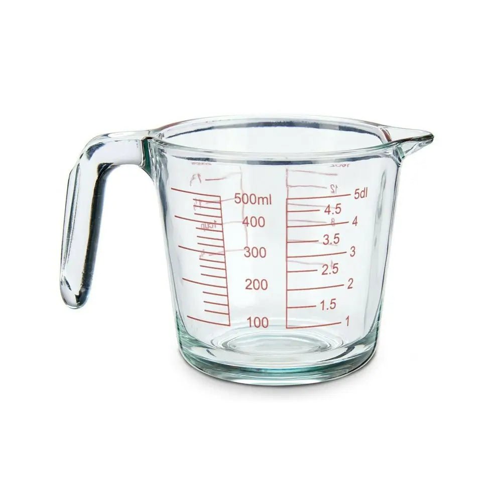 Clear milliliter measuring cup with red measurement markings, ideal for precise liquid measuring in cooking and baking tasks.