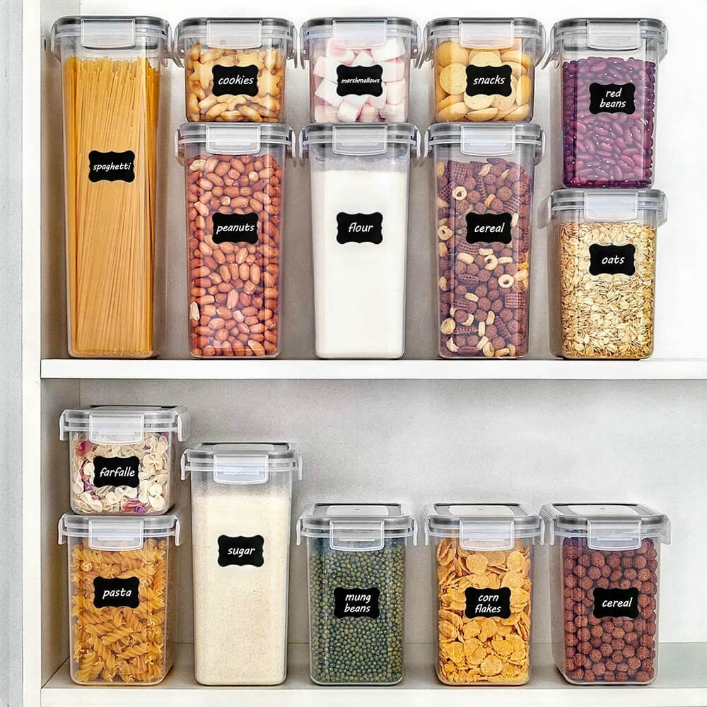 Pantry storage containers are stackable and filled with pasta, cereal, oats, sugar, beans, snacks, marshmallows, and cookies.