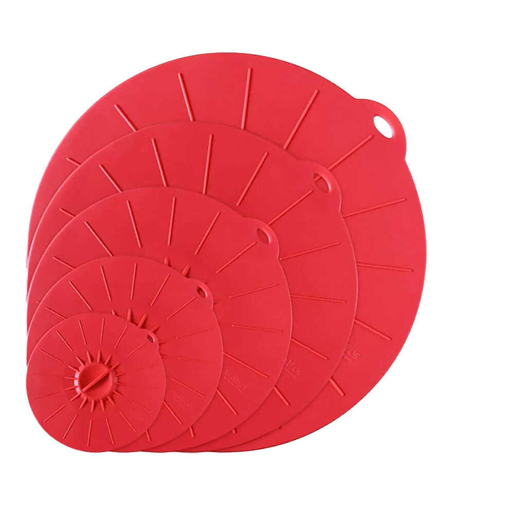 Set of red reusable silicone lids in various sizes stacked together for pots, pans, and containers.