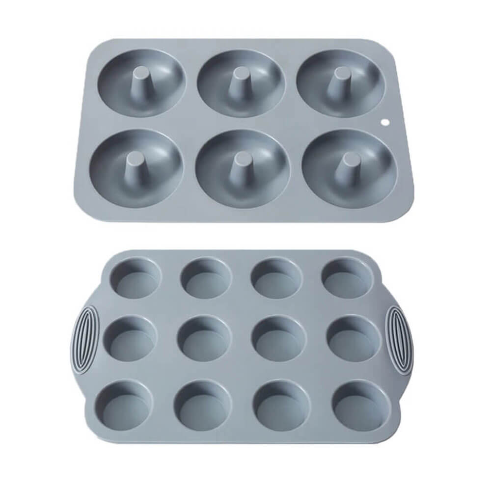 Two gray silicone baking pans: one with six donut molds and one with twelve muffin molds, displayed on a white background.