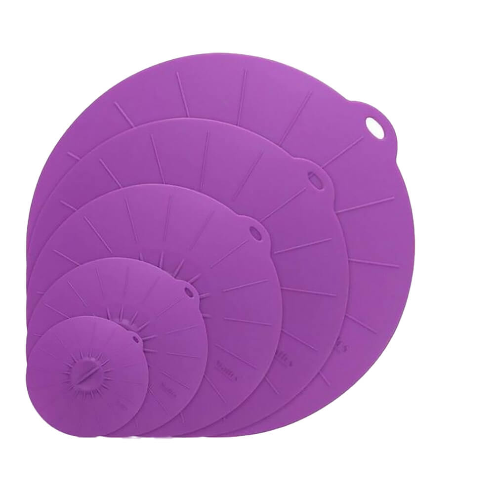 Purple silicone lids for pots in a set of five different sizes, stacked together for easy storage.