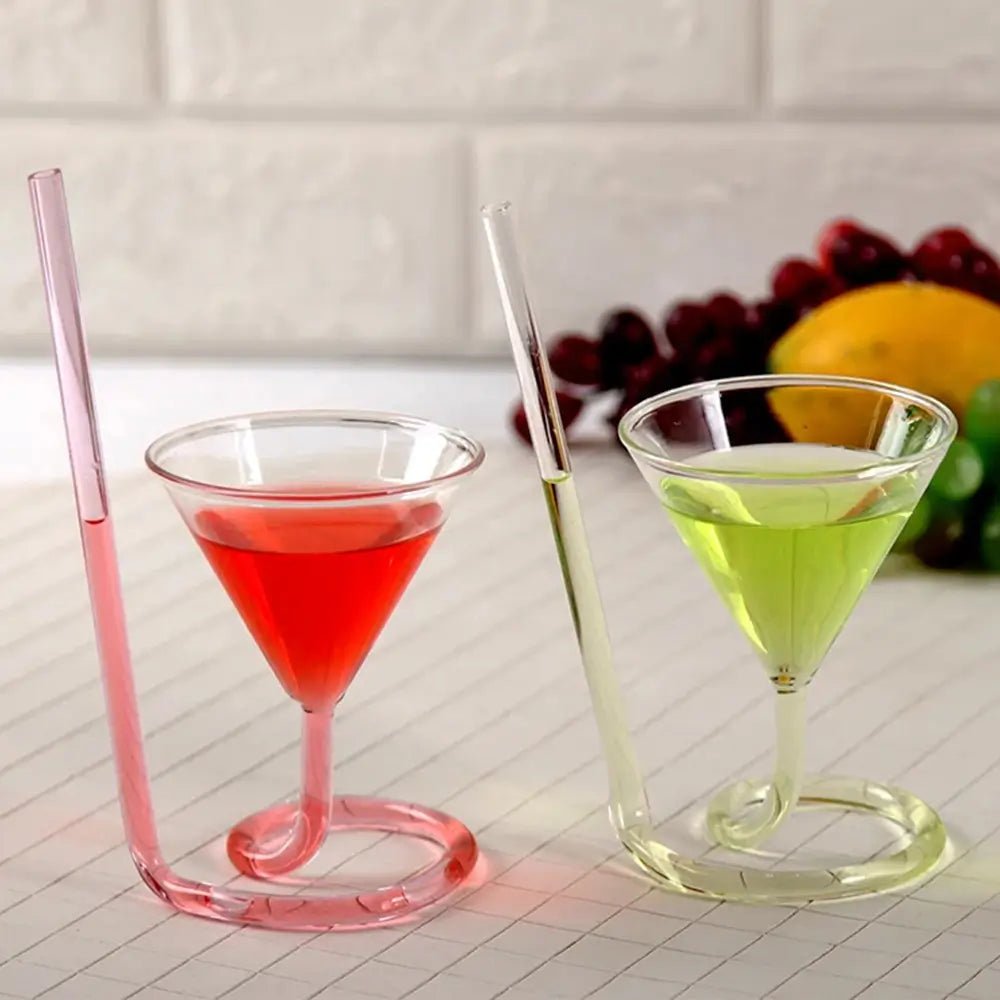 Two spiral cocktail glass spin designs with red and green drinks, featuring clear glass, spiral bases, and built-in straw stems.