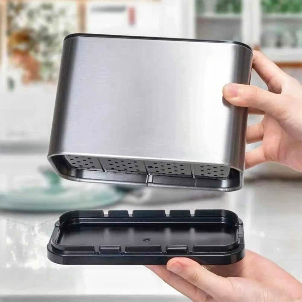 Hands holding stainless utensil holder and removable draining base, showing bottom ventilation holes for easy cleaning and drying.