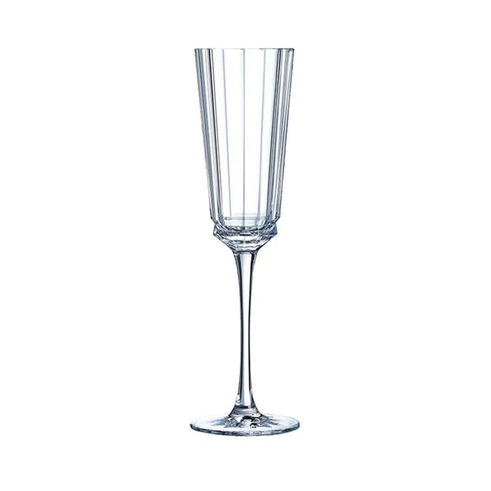 Elegant crystal stemless flute glasses with vertical geometric cuts, perfect for serving champagne, sparkling water, or mocktails with sophistication.