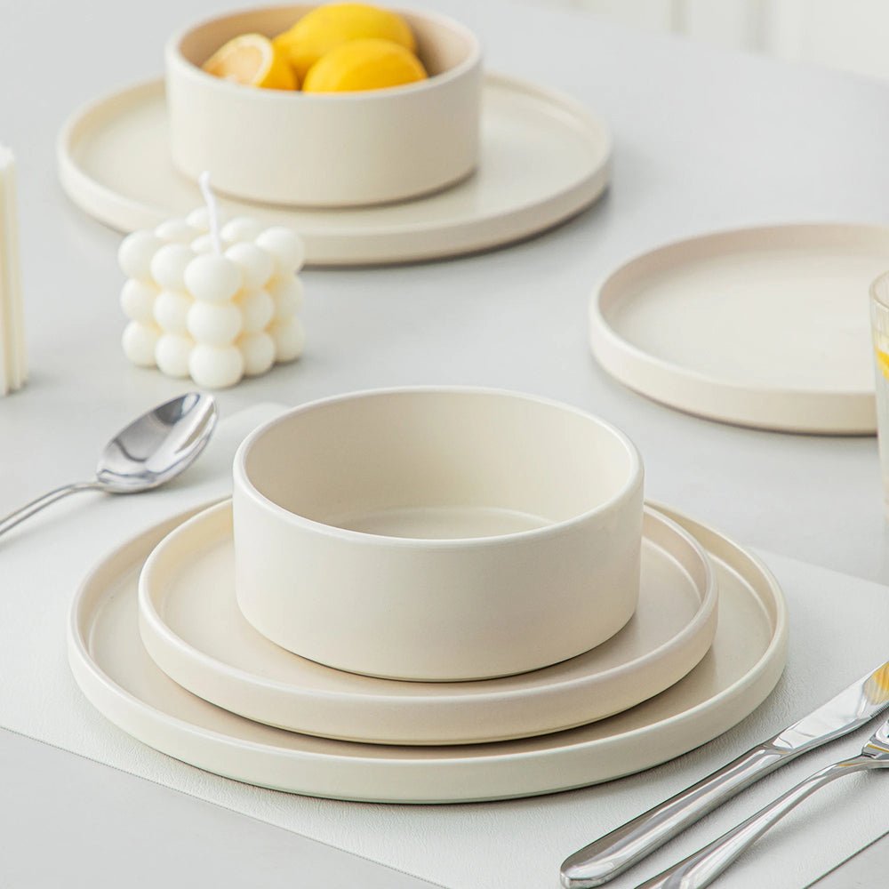 Dinner plate, salad plate, and cereal bowl displayed on the dining table, part of the 16-piece dinnerware set stoneware.