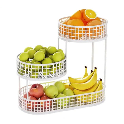 White three-tiered fruit basket with apples, oranges, bananas, and peaches on a white background