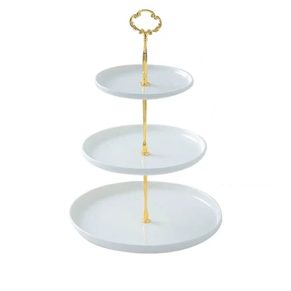 An elegant 3-tier server ceramic stand with white, round plates arranged in descending size from top to bottom. The tiers are supported by a luxurious gold-tone stand with a decorative handle, combining functionality and sophistication. Perfect for serving desserts, appetizers, or treats, this piece adds a stylish and practical touch to any gathering or table setting.