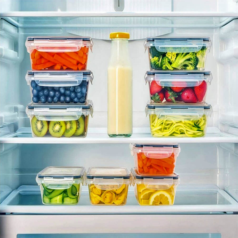 Colorful fruits and vegetables neatly stored in an airtight food storage container set, perfectly organized inside a refrigerator.