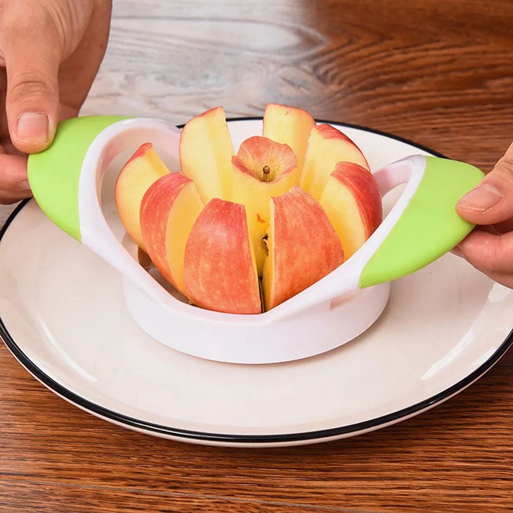 An apple corer and slicer effortlessly cutting a fresh apple into eight perfect slices while removing the core.