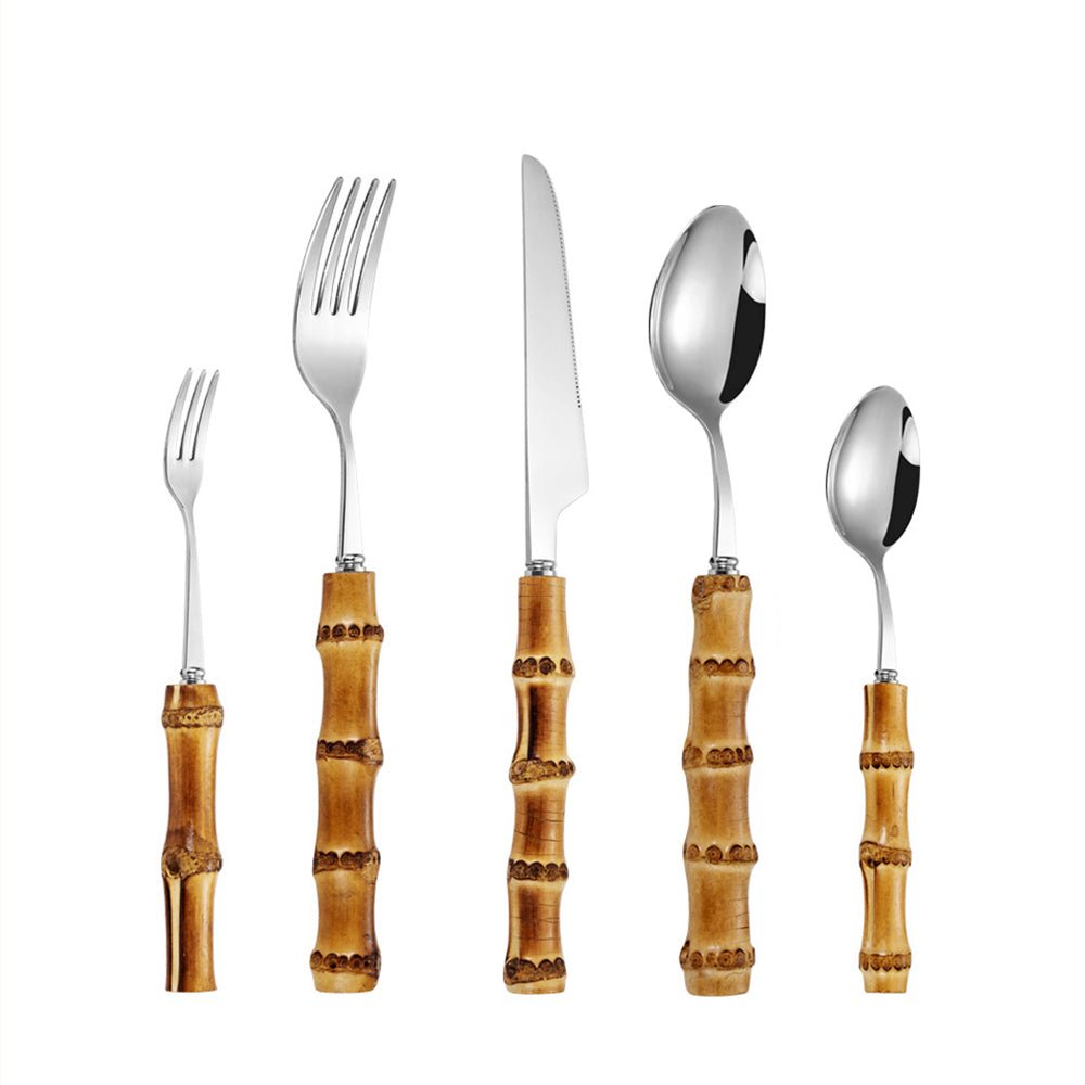 Five-piece bamboo flatware set with stainless steel heads and natural wood-style handles on a white background.