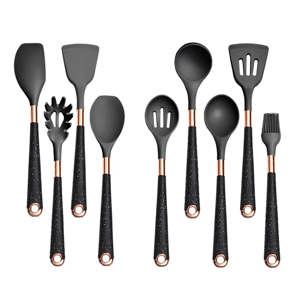 A 10-piece black silicone kitchen utensil set with rose gold accents and speckled black handles, neatly arranged upright.