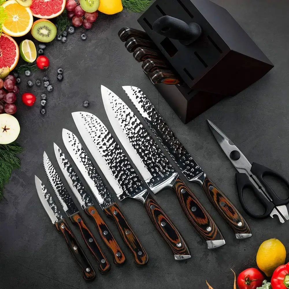 Best knife-block set with hammered stainless steel blades, wooden handles, kitchen shears, and wooden block, displayed on dark surface with fruits.