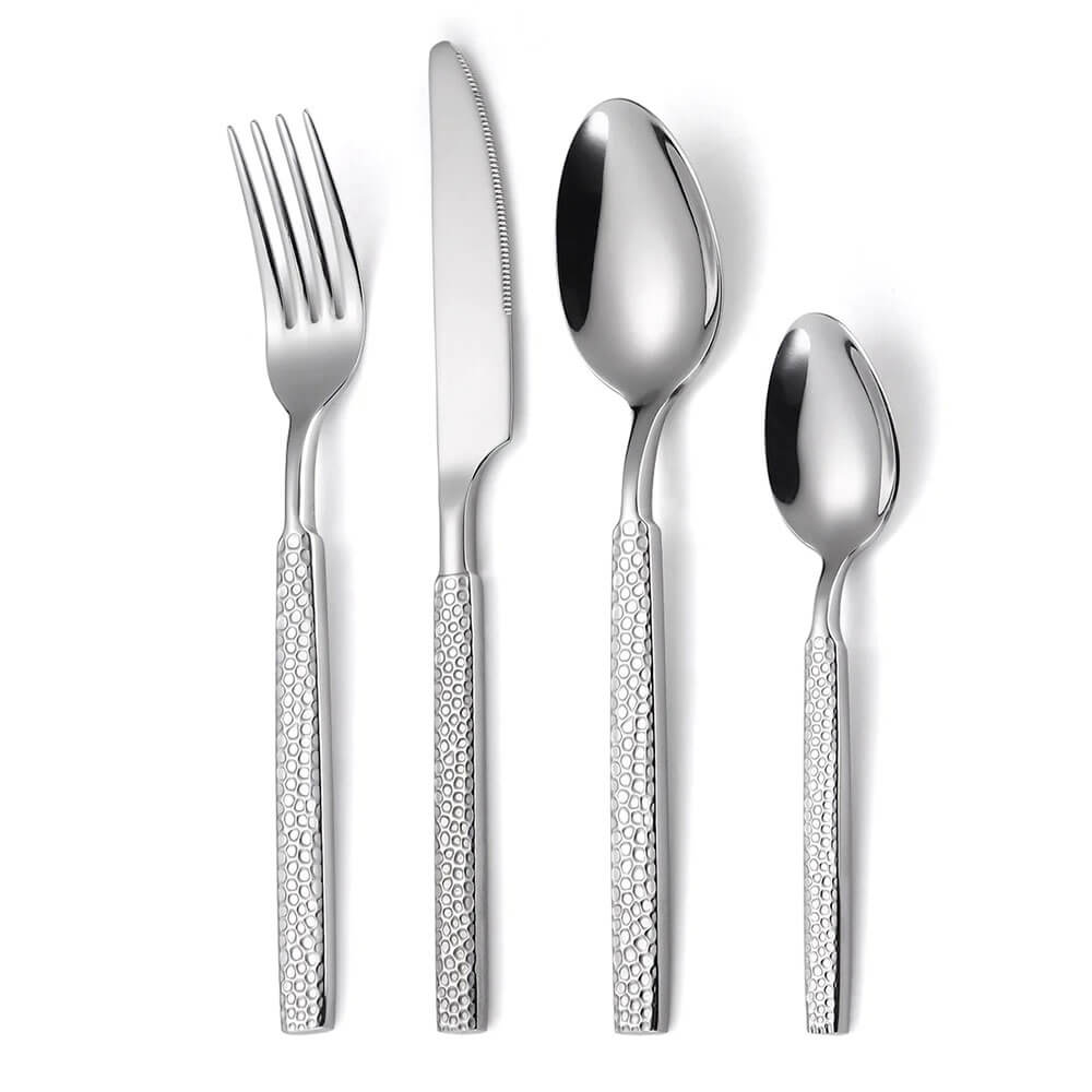 A sleek and elegant modern flatware set, featuring a polished stainless-steel finish. The set includes a fork, knife, tablespoon, and teaspoon, all with a clean and contemporary design. The handles are adorned with a subtle, honeycomb-textured pattern that adds a touch of sophistication while ensuring a comfortable grip. The shiny, reflective surfaces highlight the craftsmanship and timeless appeal, making it an excellent choice for any table setting.