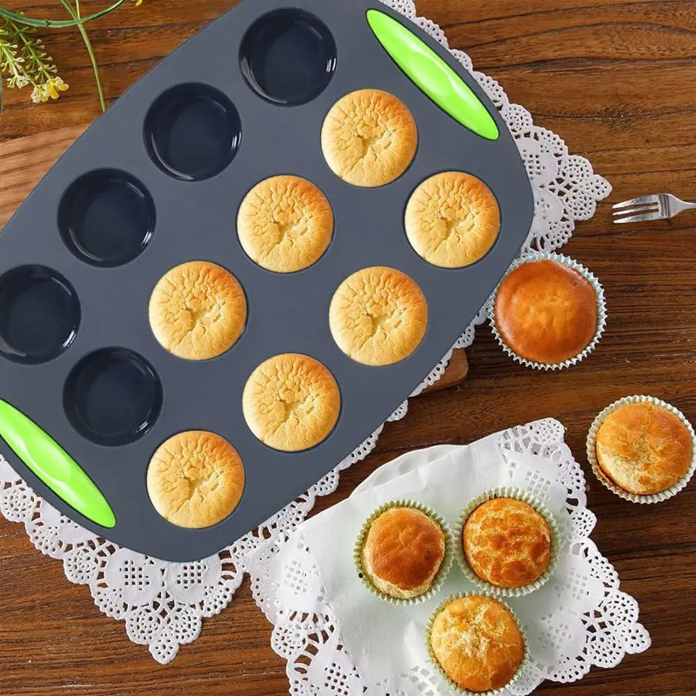 Muffin tin with baked muffins on a wooden table