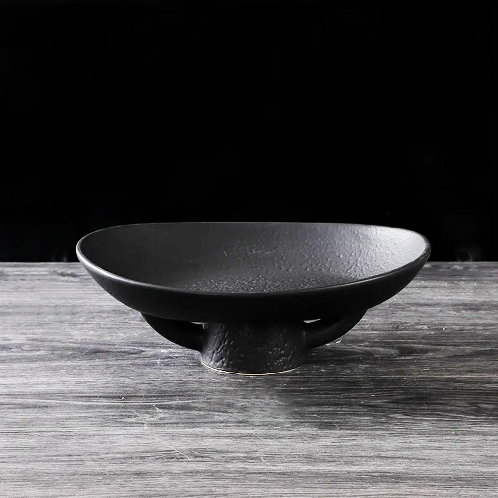 Stylish black modern fruit bowl, ideal for contemporary decor and showcasing your favorite fruits.