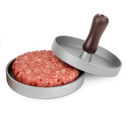 Raw meat inside a burger press, ready to be shaped into perfectly formed patties.