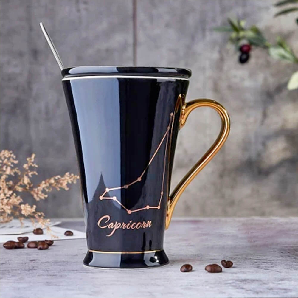 Modern black Capricorn zodiac mug with a polished golden handle, adorned with a sophisticated Capricorn constellation design and stylish script, ideal for zodiac enthusiasts.