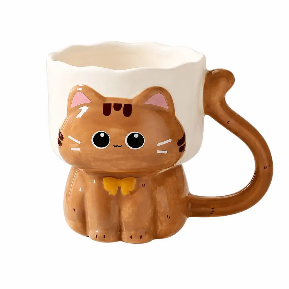 A ceramic cat-shaped mug with a brown body, white upper body, pink inner ears, black eyes, and a yellow bow tie, shown on a plain white background.