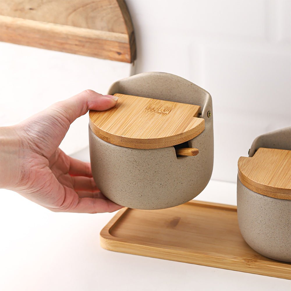 set of two and three condiment jars with a woman holding the set of 2.