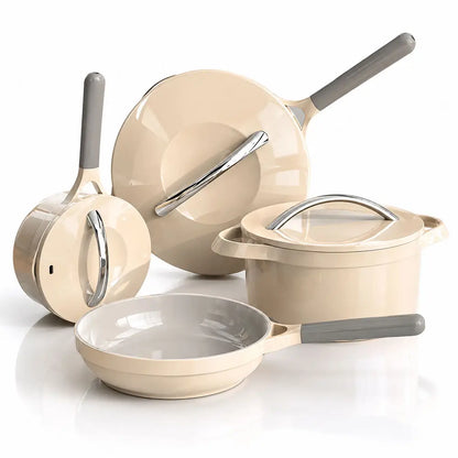 Set of beige cookware with gray handles on a white background.