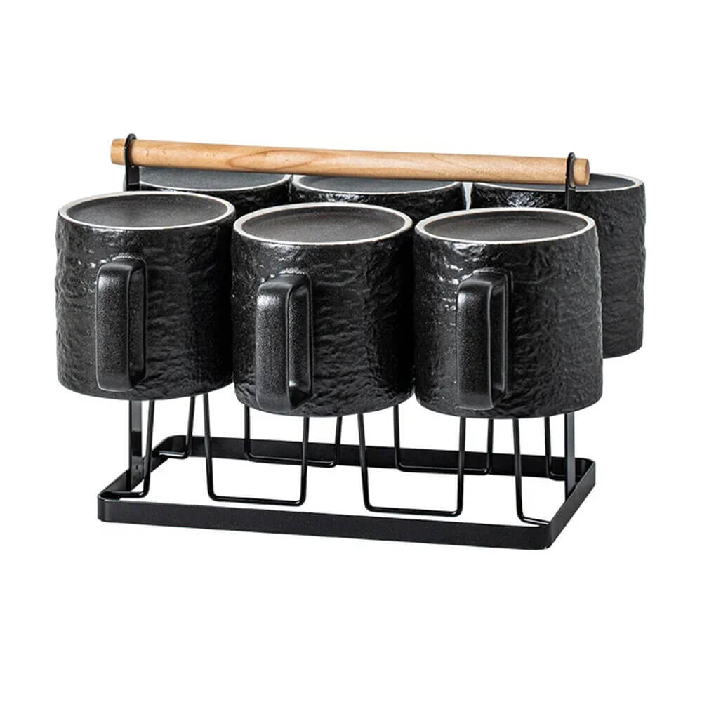 Elegant ceramic mug set with textured black mugs, sturdy metal stand, and wooden handle for easy storage.