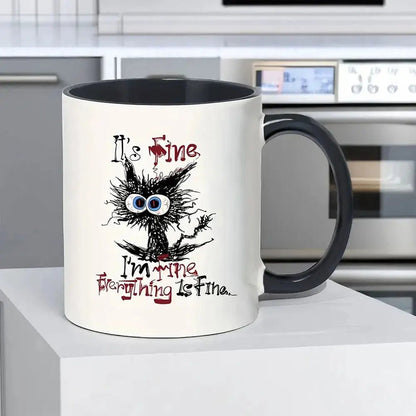 Coffee funny mug with black handle, showing a messy-haired cartoon cat with big eyes and the text &quot;It’s Fine, Everything is Fine.&quot;