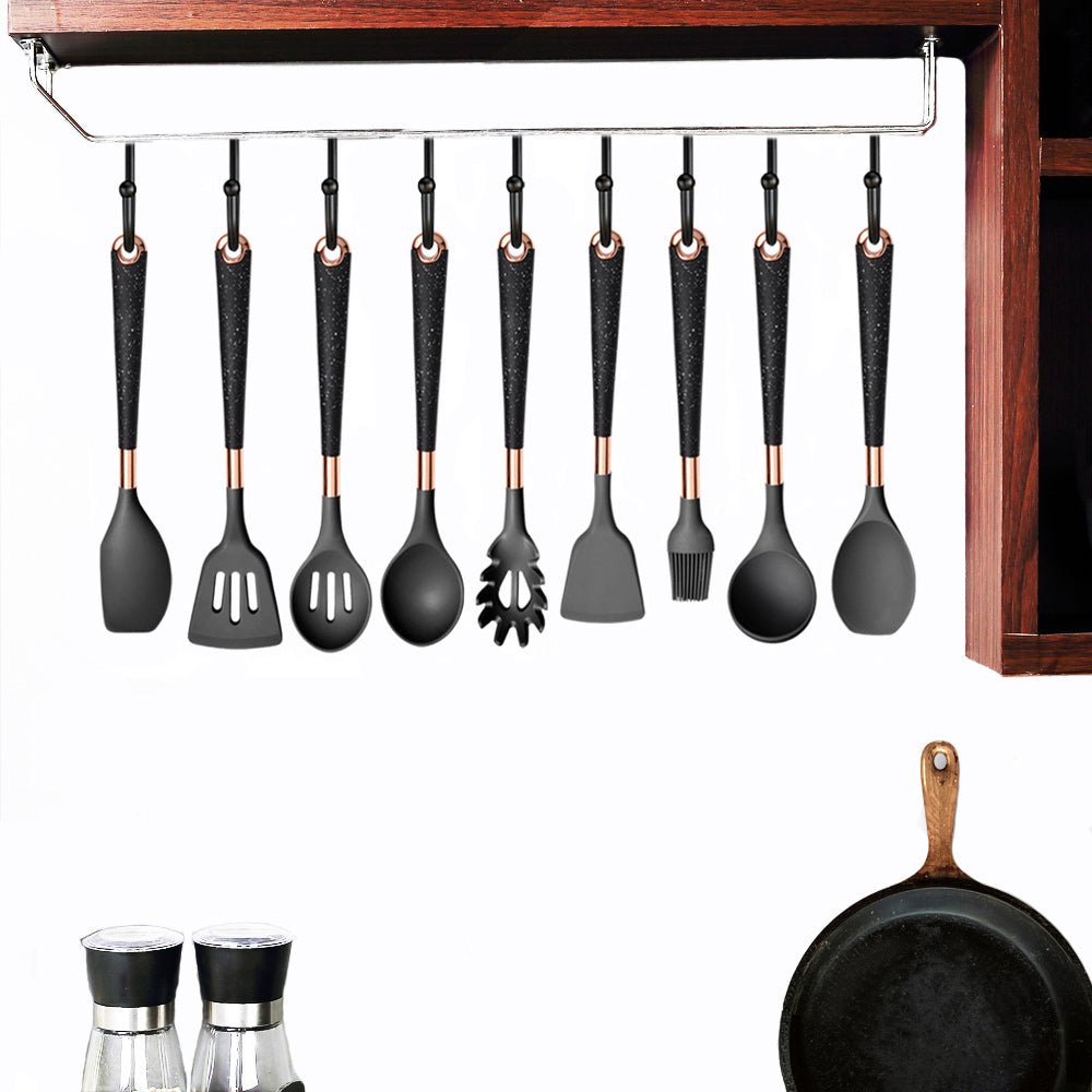 A cooking utensil set hanging in the kitchen showcases a variety of tools for everyday cooking needs.