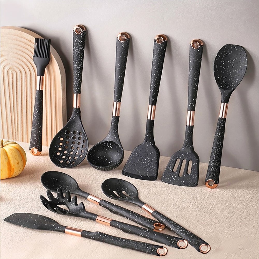 A cooking utensils set made of silicone featuring various tools, ideal for nonstick cookware and daily use.