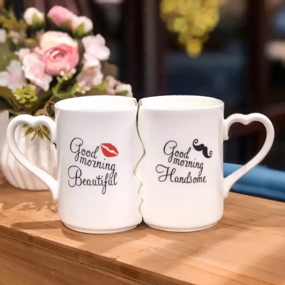 Couple coffee mugs with heart-shaped handles, featuring “Good Morning Beautiful” and “Good Morning Handsome” designs.