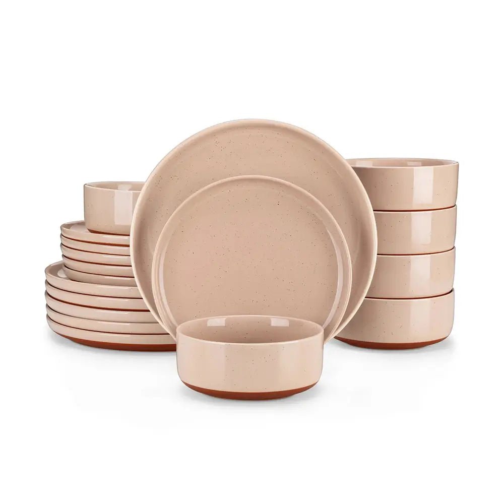 Set of beige ceramic dinnerware including plates and bowls on a white background
