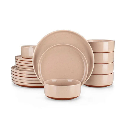 Set of beige ceramic dinnerware including plates and bowls on a white background