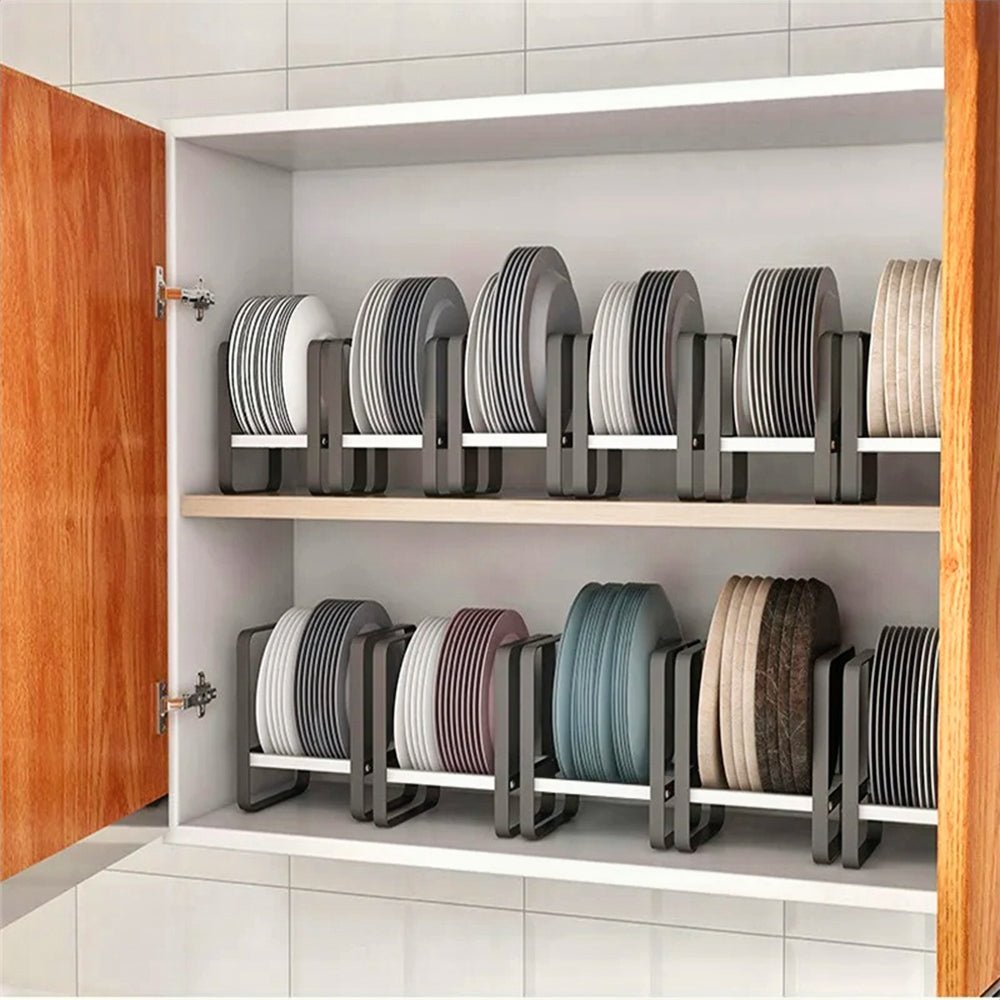 Dish storage rack set in cabinet holding various plate sizes, with a sturdy design to prevent slippage.