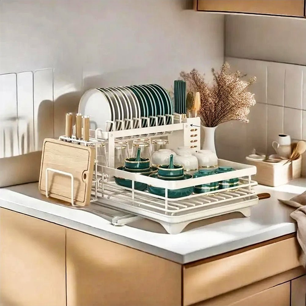 A drying rack filled with dishes, including plates, bowls, and cutlery, designed for efficient air drying.