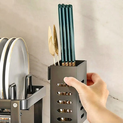 A cutlery holder integrated into the drying rack for dishes, neatly organizing forks, knives, and spoons.