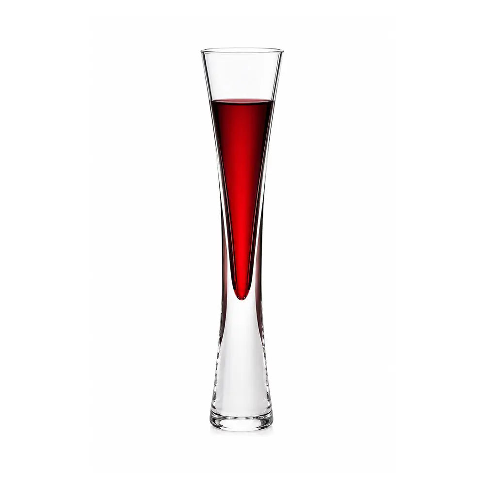 Flute glasses filled with red juice on a white background, showing the tall tapered bowl and heavy base from the front view.