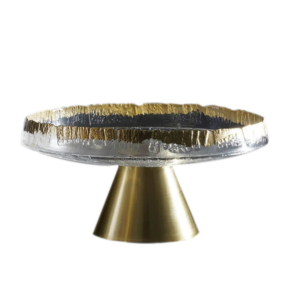 An elegant footed fruit bowl made of premium glass with a unique textured edge featuring gold and silver tones is designed with a modern brass-colored metal base for stability and style. Perfect for showcasing fruits or serving as a decorative centerpiece.