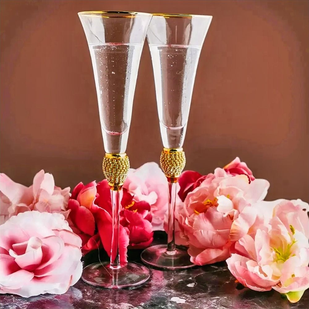 Glass champagne flutes with a sleek design and elegant sparkle, perfect for celebrating special moments.