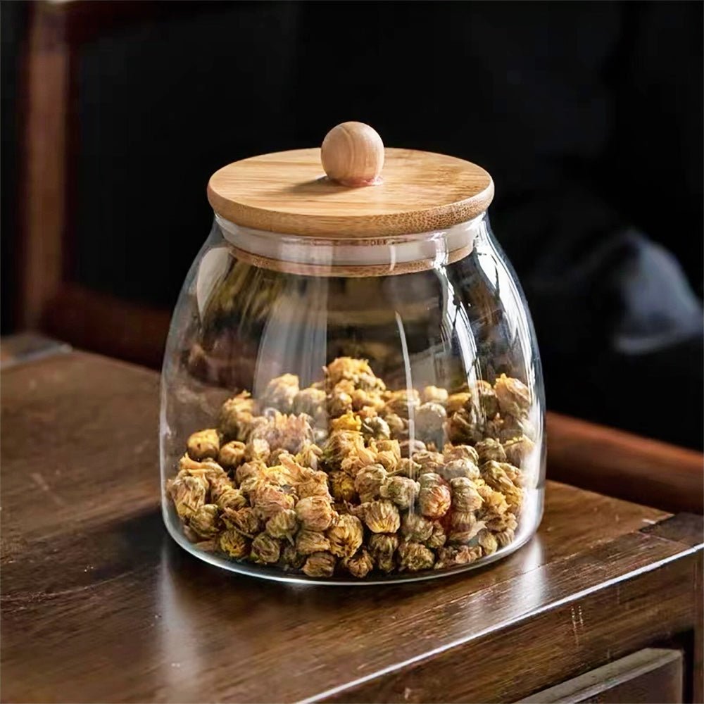 Wholesale glass jar with bamboo lid and spoon for bulk purchases.