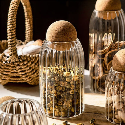 Wholesale glass jars with cork lids, perfect for storing beans and other kitchen essentials stylishly.