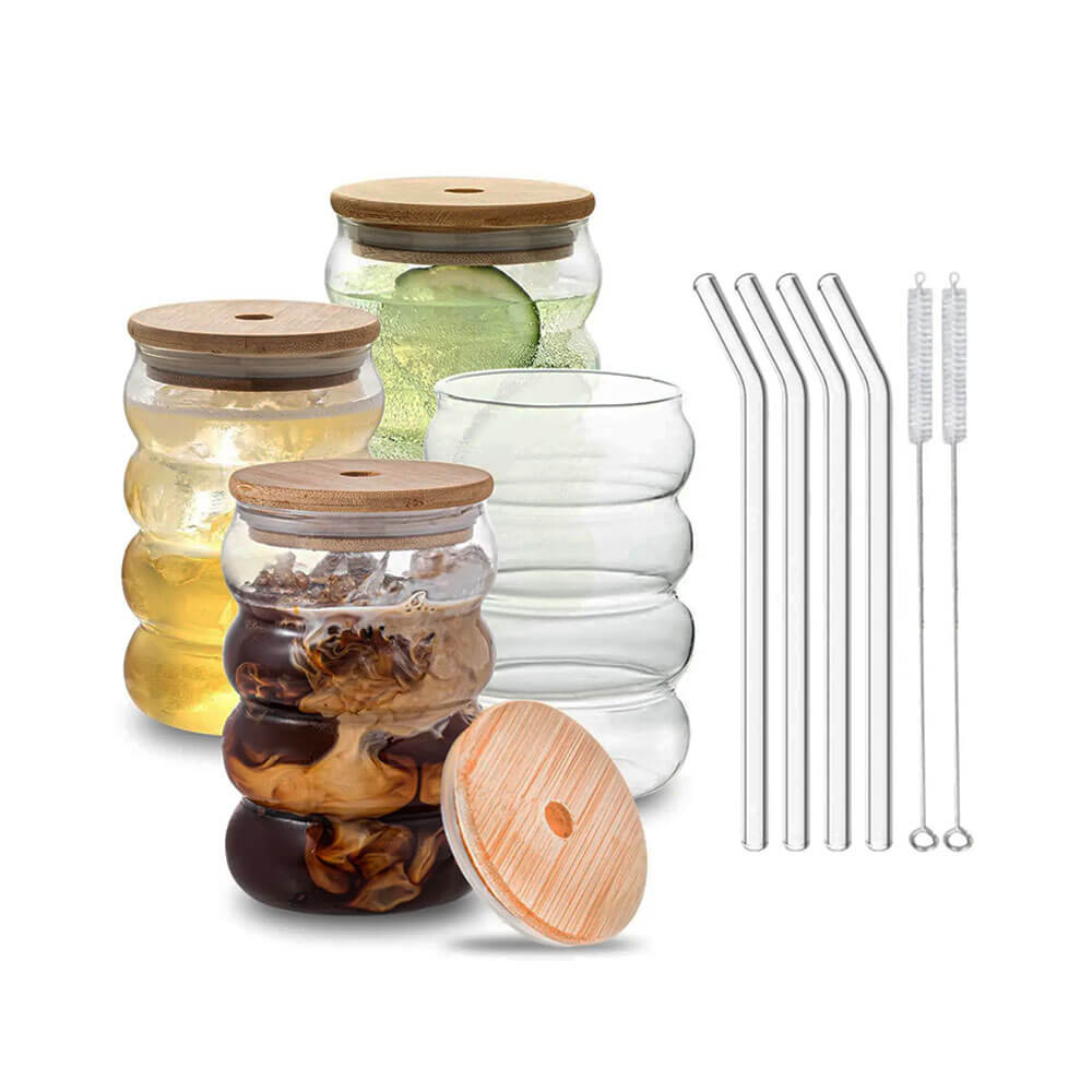Set of wavy glass tumbler with straw, featuring four clear glass tumblers with bamboo lids, four reusable glass straws, and two cleaning brushes, ideal for iced drinks and eco-friendly use.