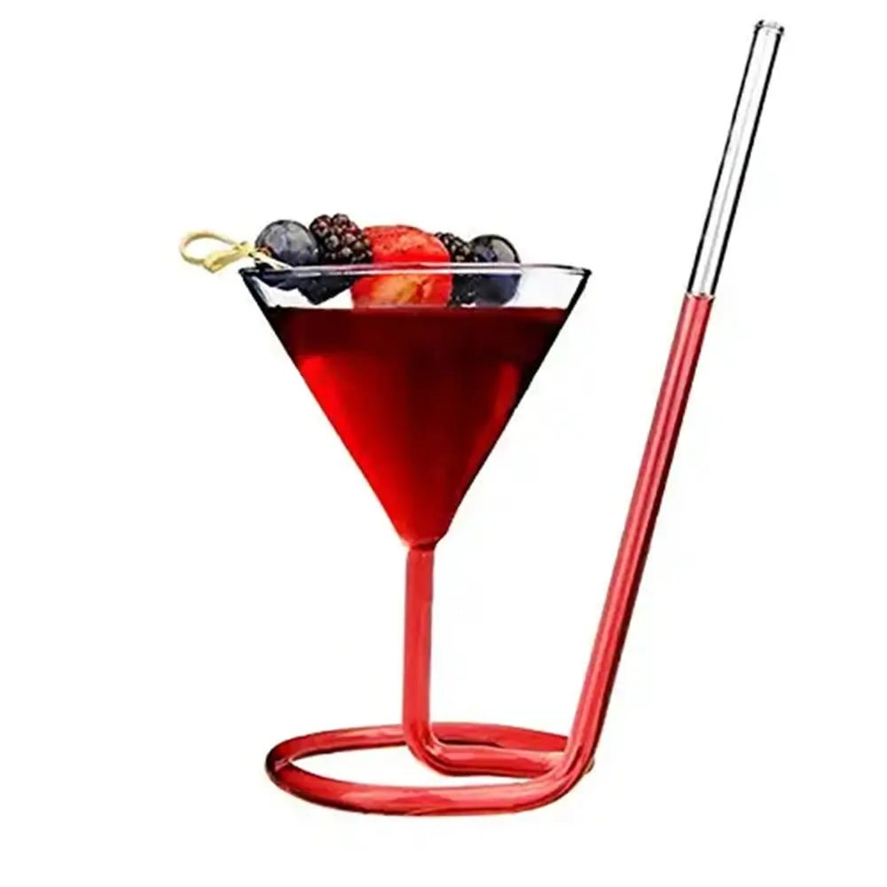 Red cocktail in a glass with berries and a metal straw on a white background