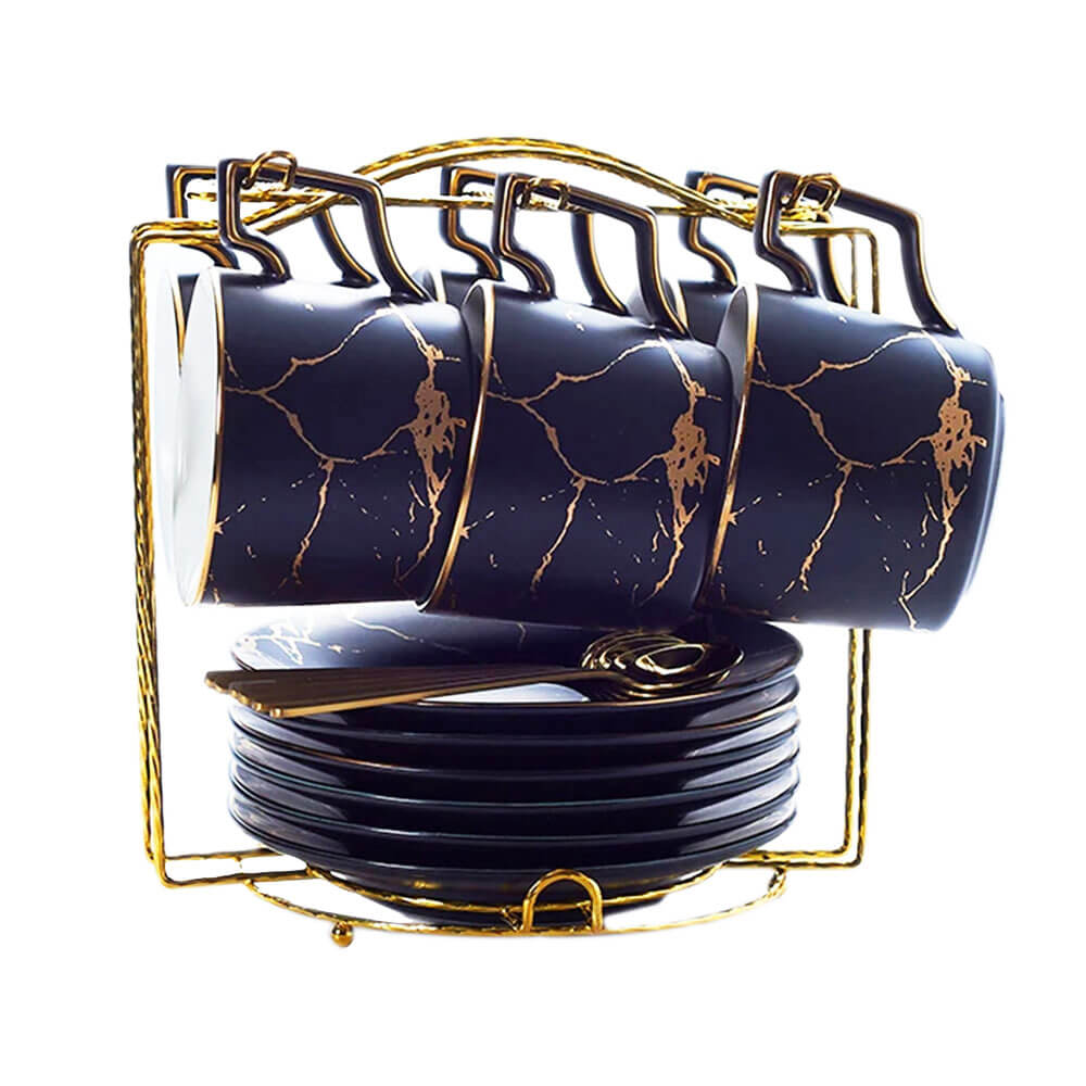 A stylish set of groups of cups and saucers with a glossy black finish, adorned with gold veining, displayed on a golden stand for an elegant and functional presentation.