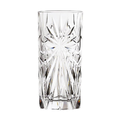 A beautifully designed crystal highball glass featuring an intricate starburst pattern showcasing its brilliance and clarity. These highball glasses are perfect for serving cocktails, sparkling water, or other beverages, which add elegance and sophistication to any table setting.